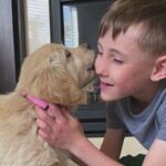 Minnesota boy with prosthetic leg gets puppy born without paw.