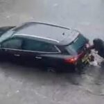 Hero Dog Helps Owner Push Stranded Car Out Of Floodwaters In Scotland.